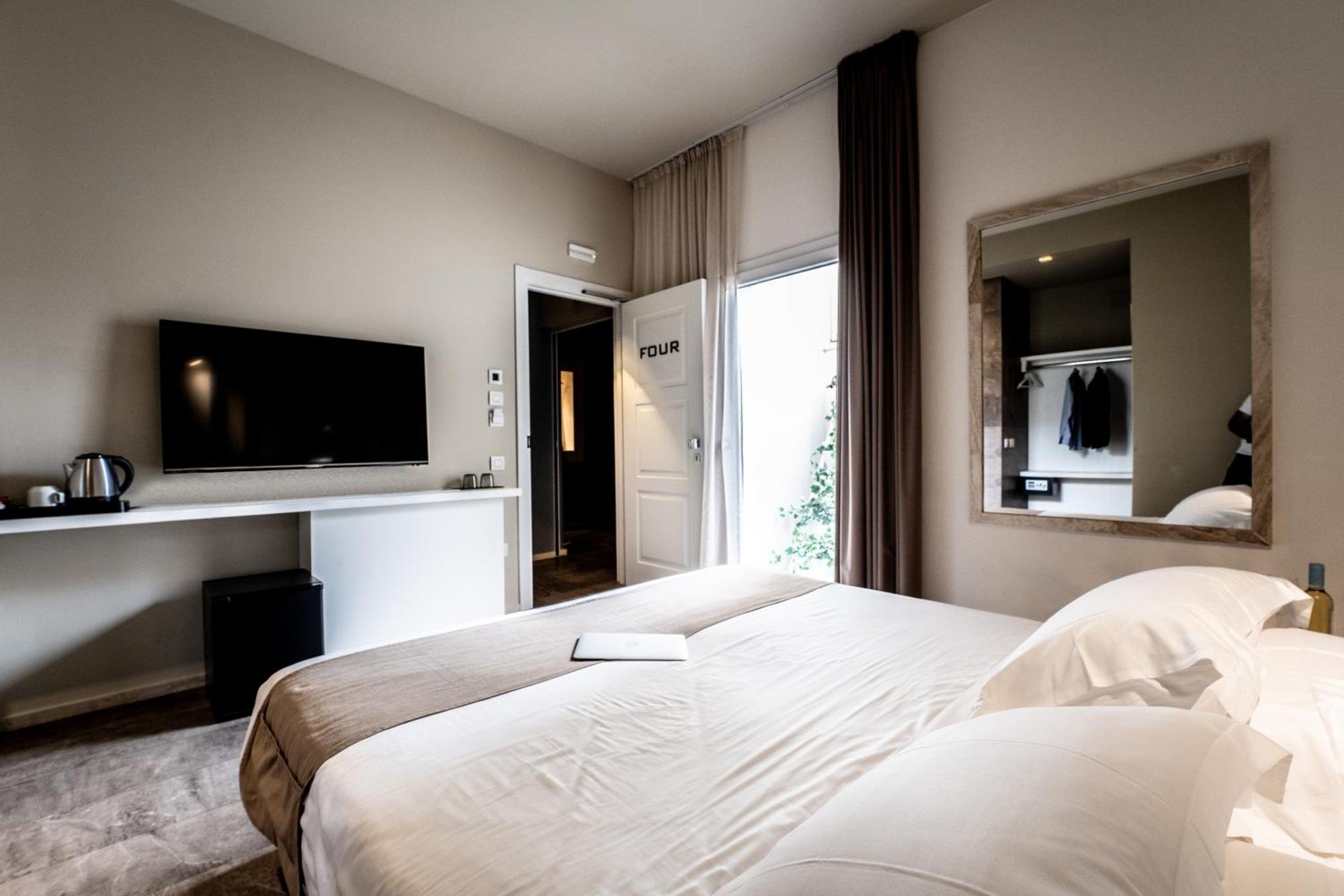 Neko Boutique Hotel Кальяри Экстерьер фото