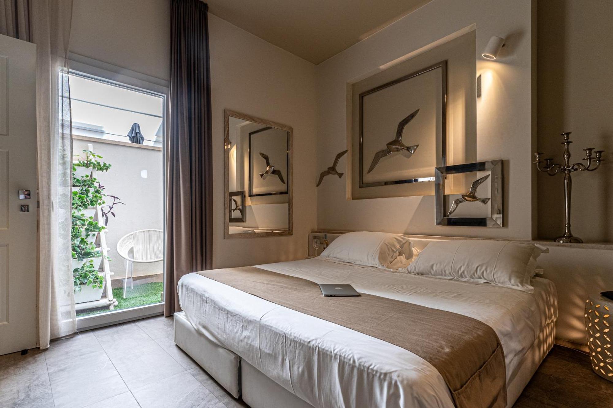 Neko Boutique Hotel Кальяри Экстерьер фото